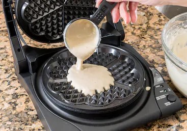 Pouring-Batter-on-waffle-maker