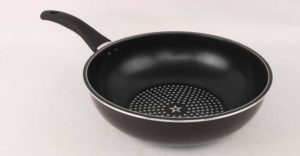 black colored omelet pan with black handle