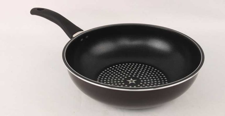black colored omelet pan with black handle