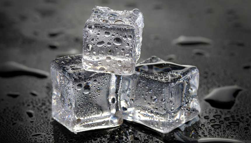 3 Dice Cubes of Ice on A Table