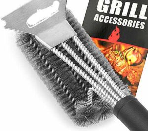A grill cleaner brush with package around