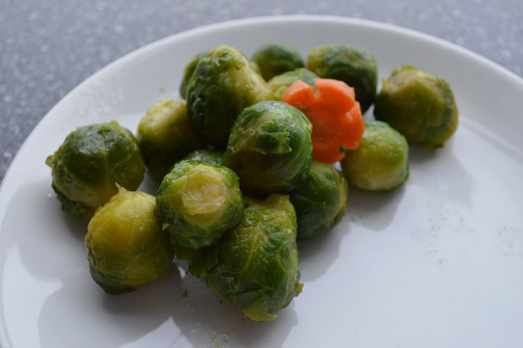 brussels sprouts in a white plate