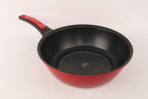 Close up of a red omelette pan