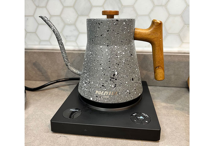 Close up of Poliviar Electric Gooseneck Kettle on an electric stove