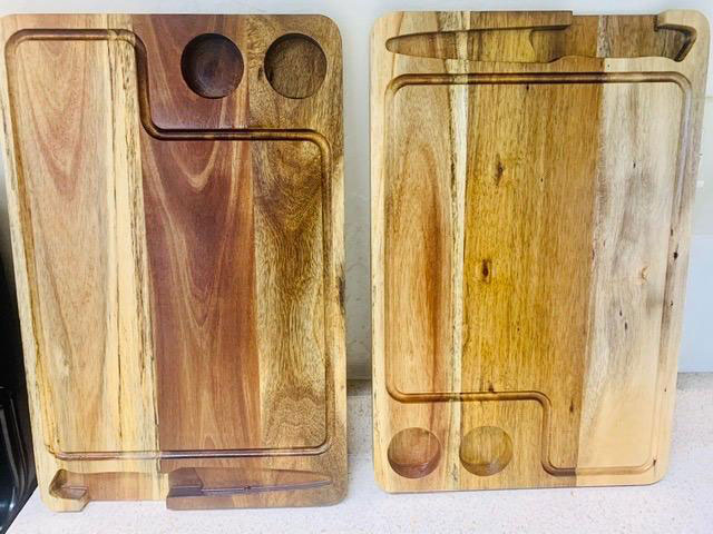 Close up of a wooden cutting board with before & after using an oil