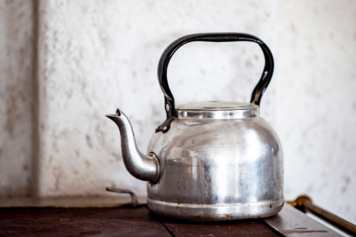 Close up of a steel tea kettle 