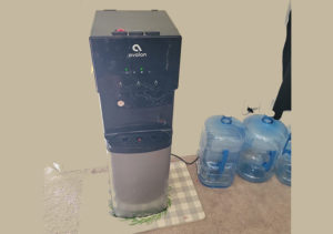 Avalon bottom loading water wispenser with water bottles around